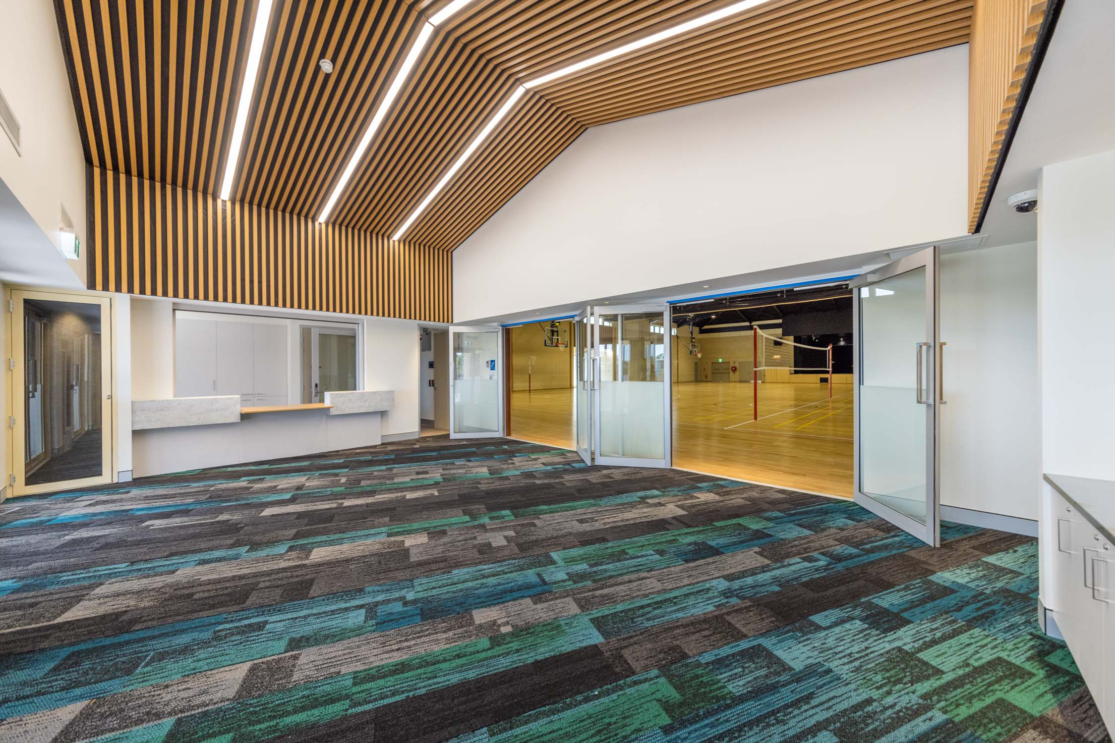 Completed EAC Multi Purpose Centre foyer opening onto the sports hall